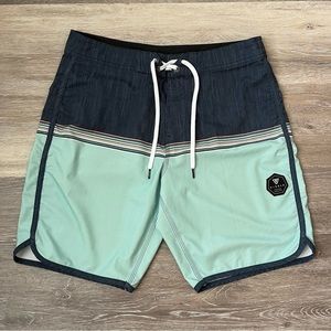 Vissla Velcro & tie waist men’s board shorts, no size tag-measures as a medium.